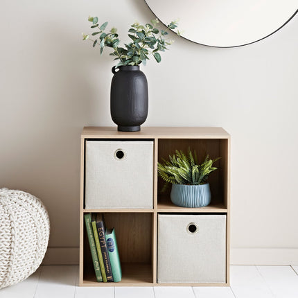 Side angle of small cube shelf unit with fabric storage bins